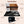 Load image into Gallery viewer, Pressice Barware Ice Ball Press Kit with anodized aluminum ice ball press, glasses, coasters, tongs, and silicone cube mold on a bar mat.
