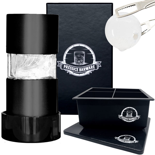 Black barware set with ice maker, container, and tongs on a white background.